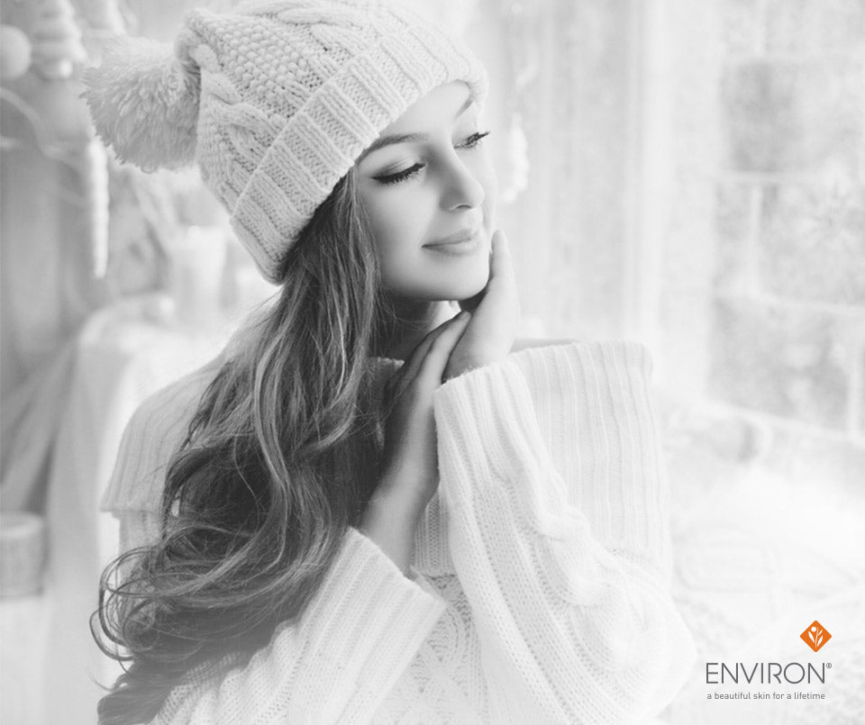 Knit beanie with cable pattern and fluffy pom pom in neutral color for winter skin protection and warmth