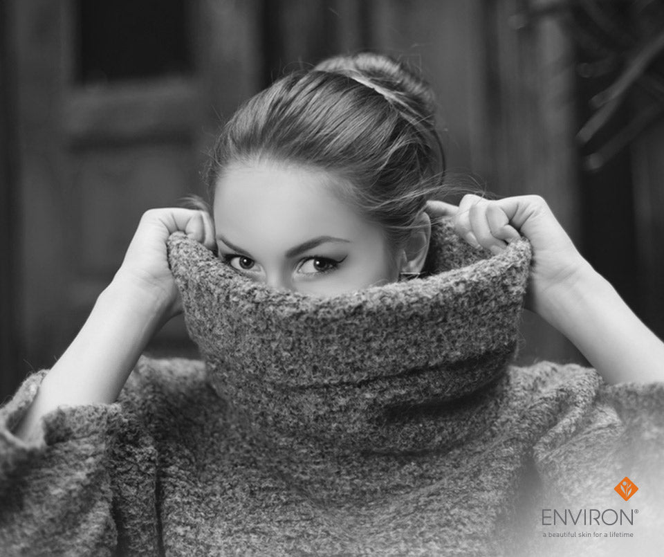 A thick textured knit sweater with a high cozy cowl neck for comfortable wear in cold weather