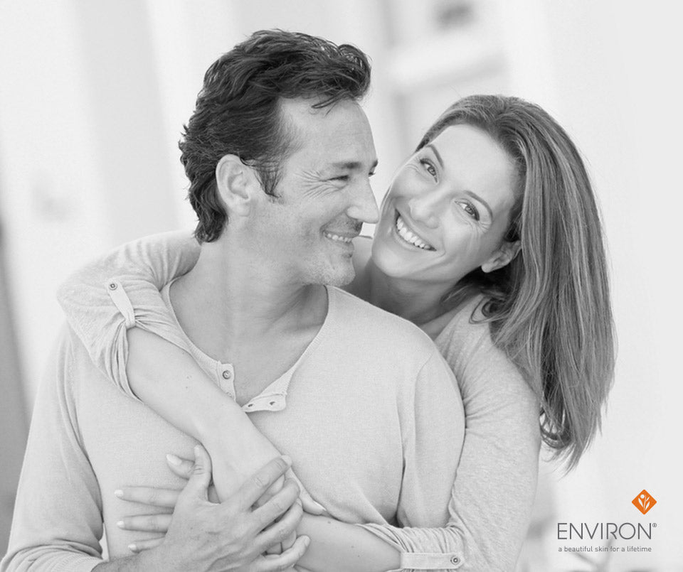 Black and white photograph of a man and woman embracing in an article titled radiance at every age youth essentia
