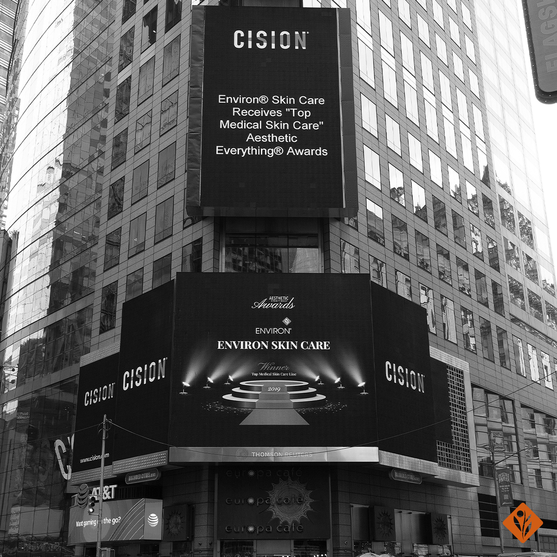 Black digital billboard displaying cision and environ skin care advertising for 2019 top medical skin care award
