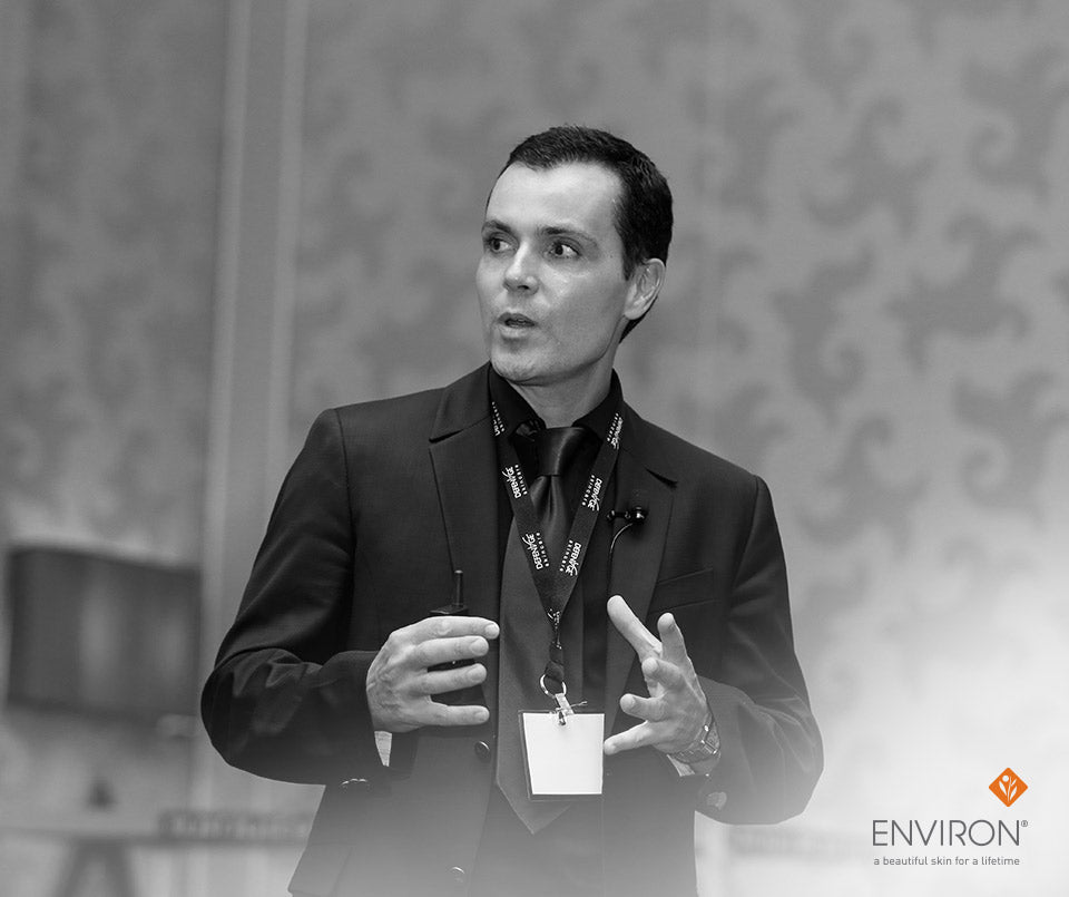 Black suit jacket with matching tie and environ logo lanyard for environ workshops and trainings in january