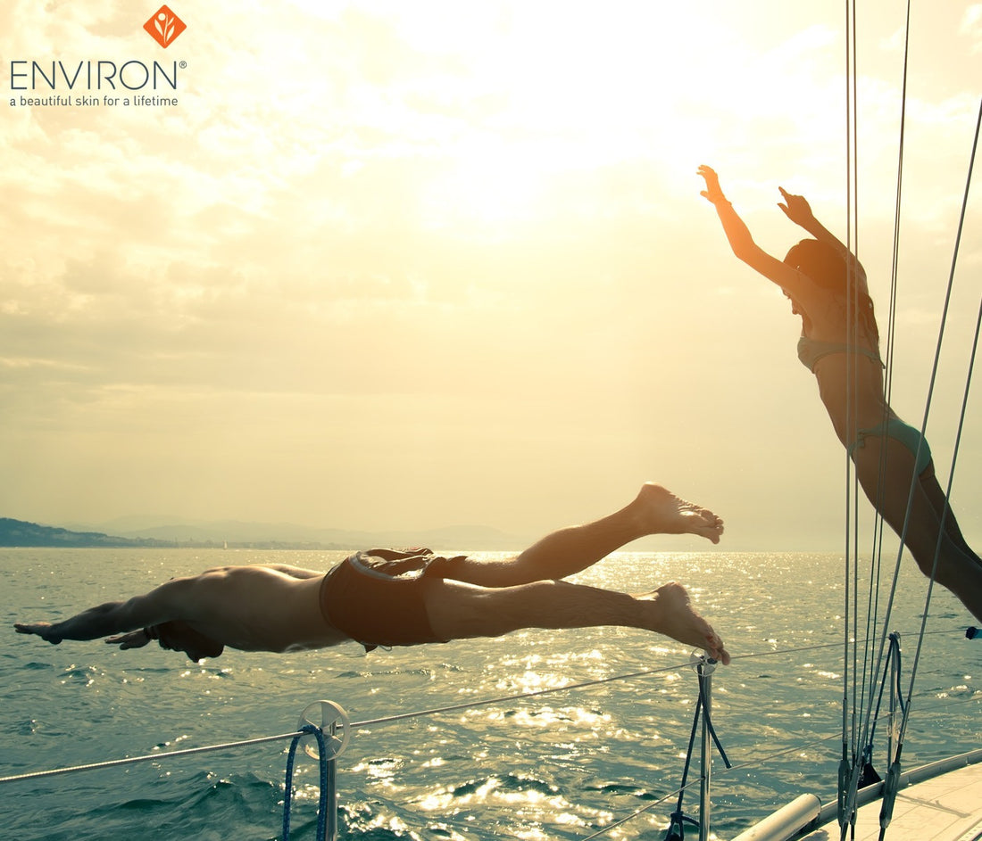 A woman in a teal bikini jumps from a sailboat deck into the sunlit ocean in an article on summer skin care woes to avoid