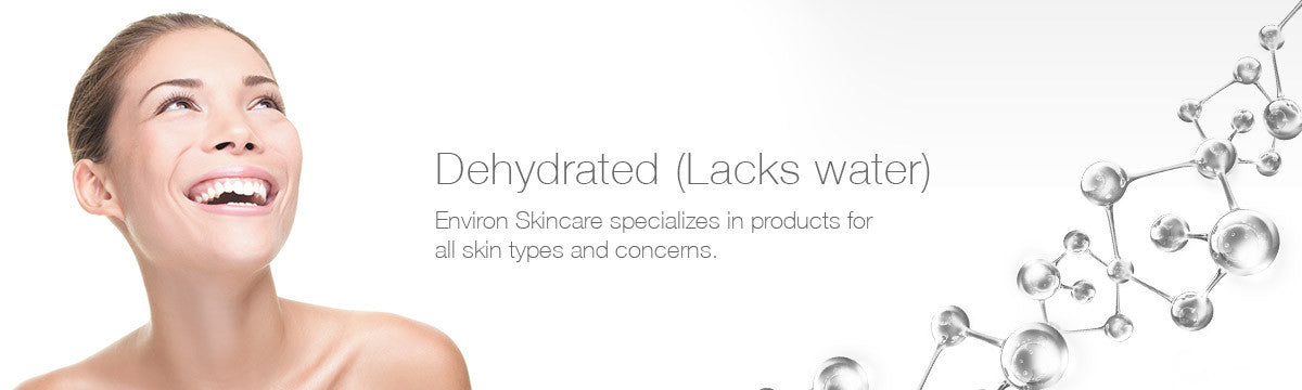 A smiling woman with fair skin and dark hair pulled back in a collection titled dehydrated lacks water.