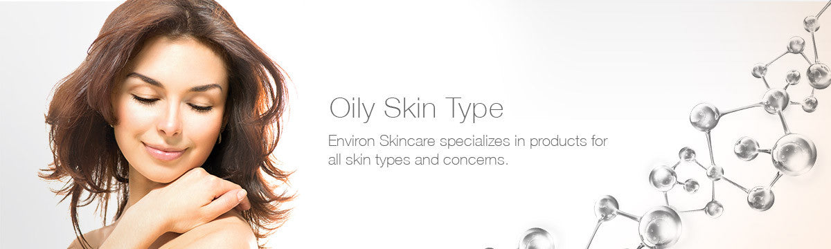 A woman with brown hair and a gentle smile posing in an oily skin collection with no visible clothing or accessories