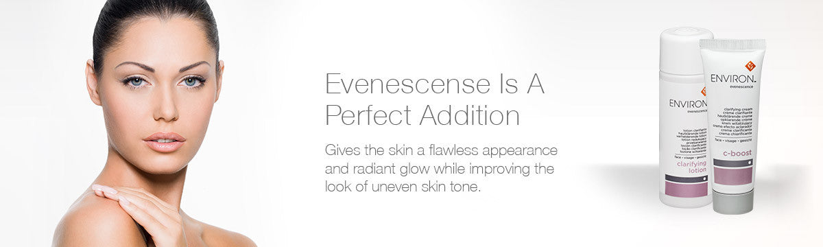 White cylindrical skincare tubes with silver caps and purple accents from environ’s evenescence range collection.