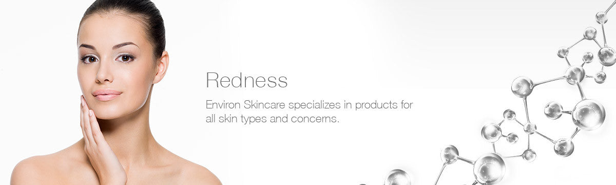 A woman with smooth fair skin gently touching her cheek in a promotional environ skincare redness image.