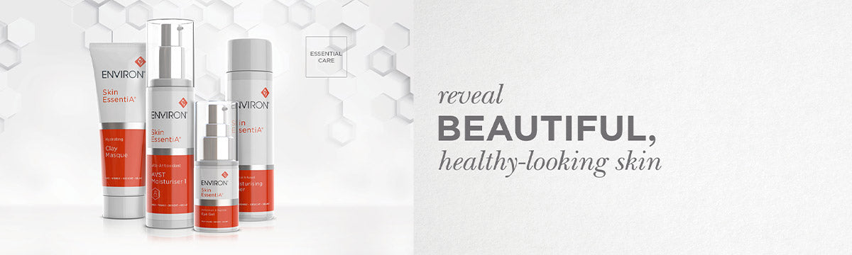 Silver and red skincare bottles with sleek modern design from skin essentia environment skin essentials collection