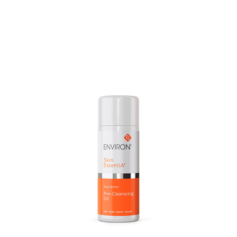 A sleek white and orange bottle of Environ Skin EssentiA Dual Action Pre-Cleansing Oil stands centered against a clean white background.
