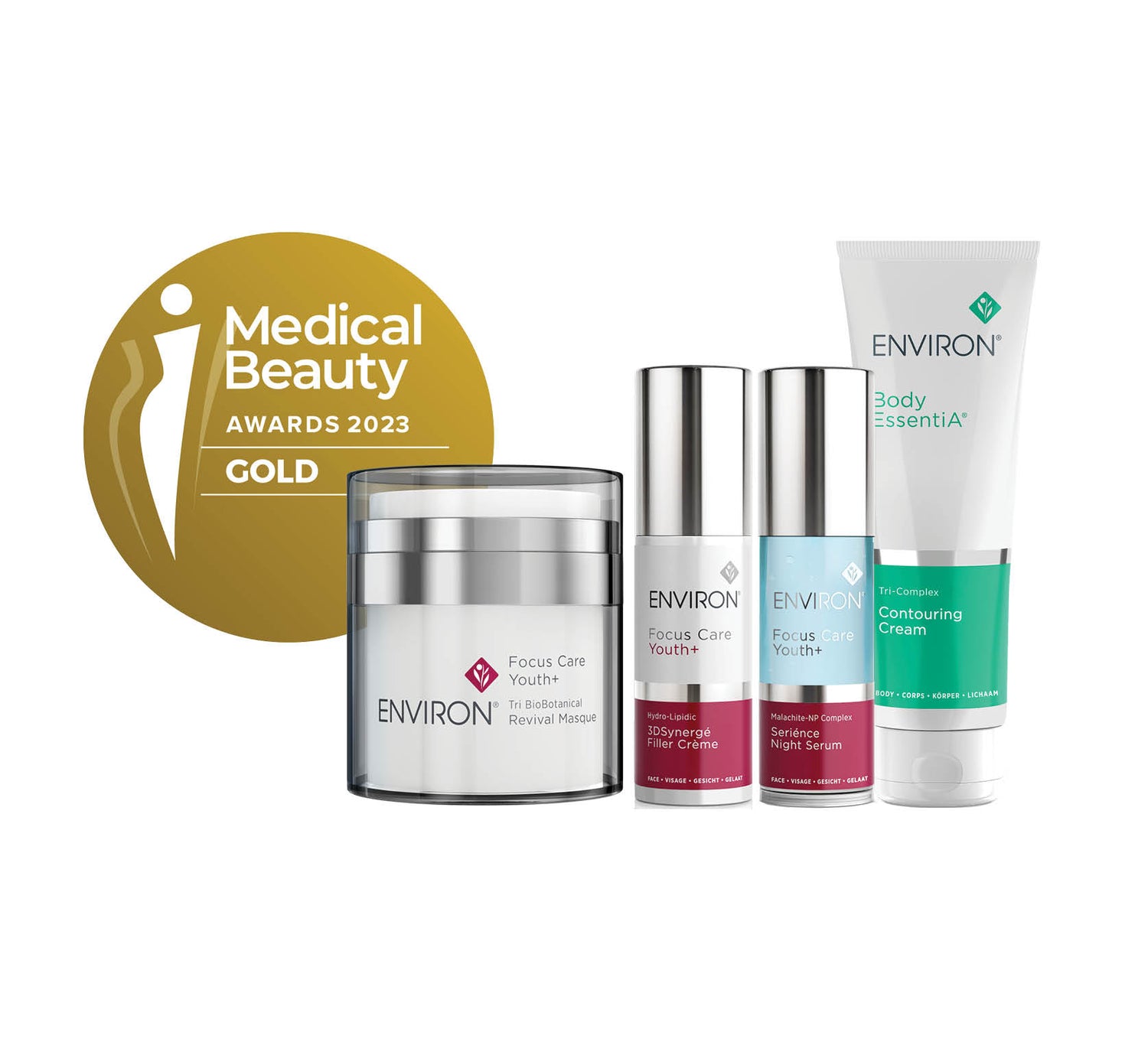 Silver and white environ focus care youth+ skincare set featuring a jar, two serums in glass bottles with metallic caps, and a tube of contouring cream.