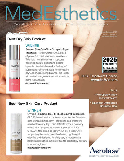 The environ skin care vita-complex super moisturiser is a sleek, cylindrical bottle with a silver cap and transparent body revealing its pinkish-red contents.