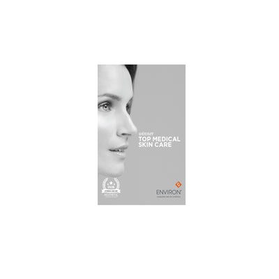 Gray rectangular package featuring a black-and-white portrait of a woman’s face and the brand name ’environ’ in white text.