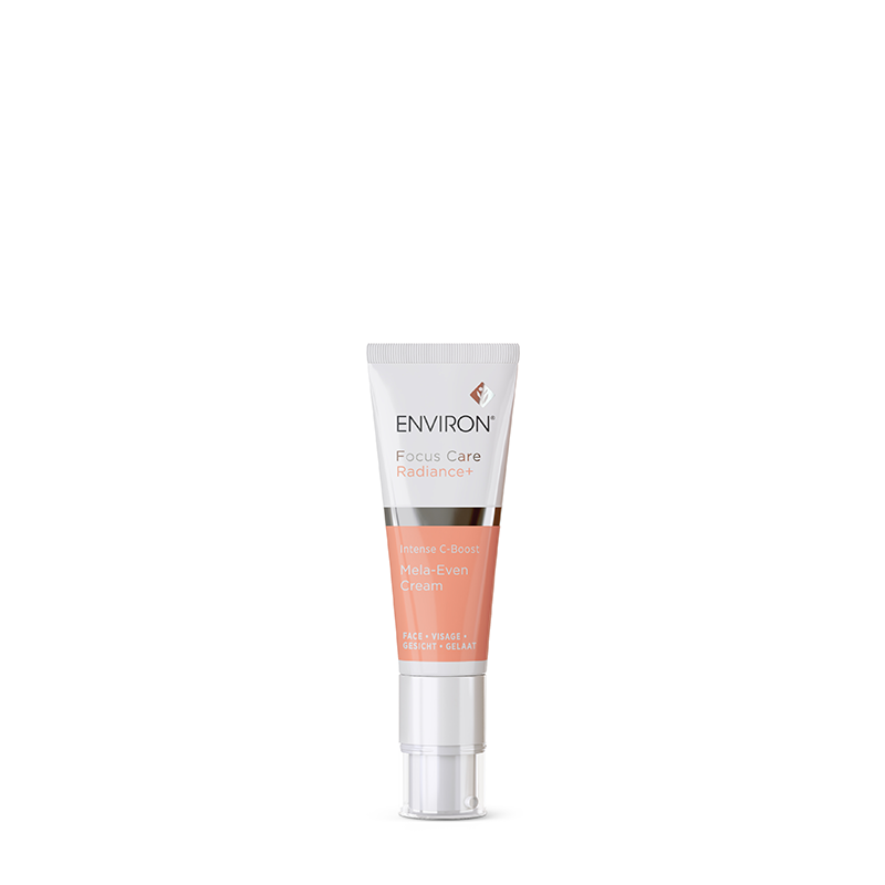 Environ Focus Care Radiance+ Intense C-Boost Mela-Even Cream stands upright in a sleek white and peach tube with a clear pump dispenser.