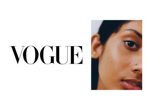 Vogue magazine cover featuring a close-up portrait of a woman with dark hair and skin, wearing a nose piercing.