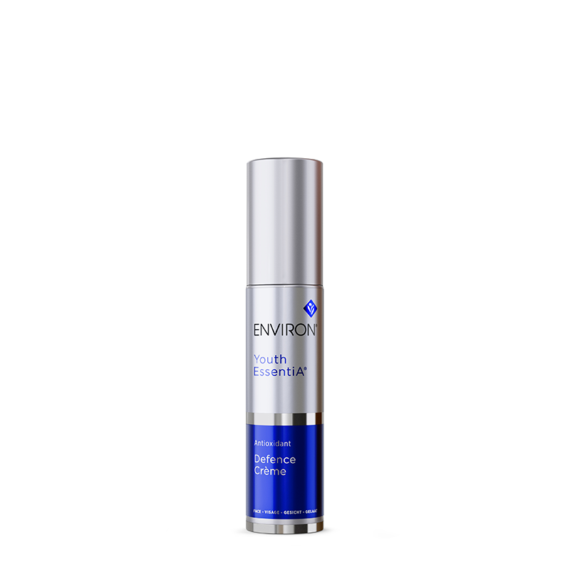 A sleek silver and blue pump bottle of Environ Youth EssentiA Antioxidant Defence Crème stands against a plain white background.