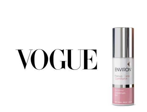 Silver-topped serum bottle with a white label and pink base, branded as ’environ focus care comfort+’