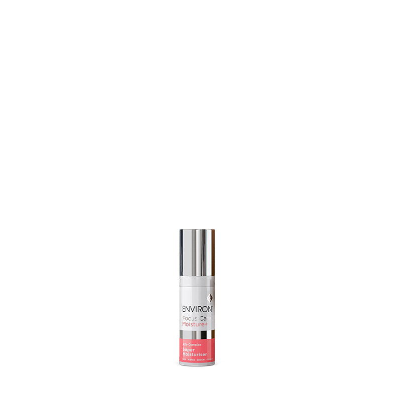 A sleek white and silver bottle of Environ Focus Care Moisture+ Vita-Complex Super Moisturiser stands against a white background.