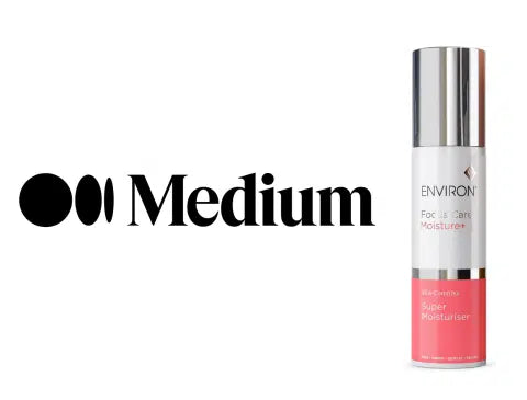 Silver and coral pink cylindrical bottle of environ face &amp; care super moisturiser