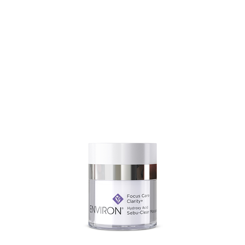 A white and silver jar of Environ Focus Care Clarity+ Hydroxy Acid Sebu-Clear Masque stands against a clean white background.