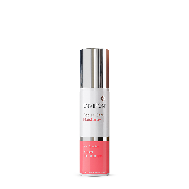 A sleek bottle of Environ Focus Care Moisture+ Vita-Complex Super Moisturiser stands upright against a white background, showcasing its silver cap and vibrant coral-colored label.