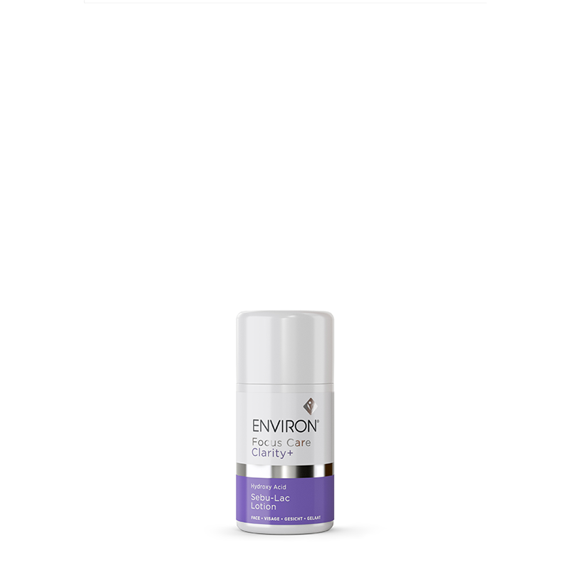 A bottle of Environ Focus Care Clarity+ Sebu-Lac Lotion with hydroxy acid stands against a plain white background.
