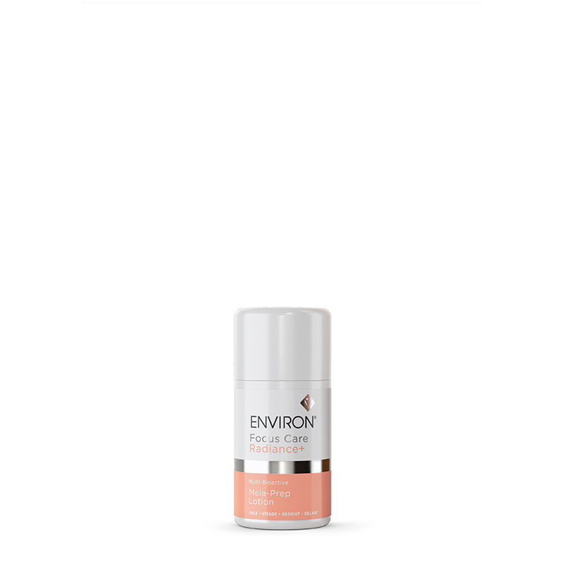 Environ Focus Care Radiance+ Multi-Bioactive Mela-Prep Lotion stands in a sleek white and orange bottle, providing a professional skincare solution for a radiant complexion.