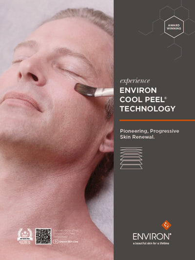 Environ cool peel technology skin treatment brush with a sleek metallic handle and soft bristles, designed for professional-grade facial peels.