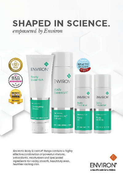Set of four white and teal environ body essentia skincare products with silver caps.