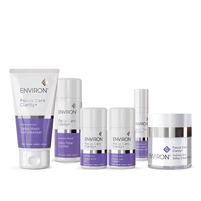 A complete set of Environ Focus Care Clarity+ skincare products for blemish-prone skin features a gel cleanser, clarifier, oil, lotion, spot treatment, and masque.