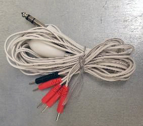 A coiled white medical lead cable features a silver quarter-inch stereo jack and five small red and black pin connectors.