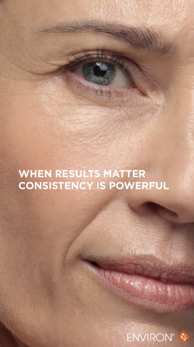 A close-up of a woman’s face with soft, natural skin tones and subtle makeup.