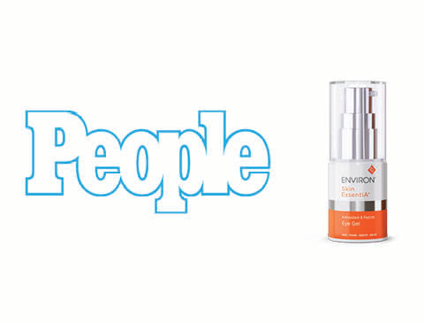 The environ acid essentials eye gel in a sleek, transparent pump bottle with an orange and white label.