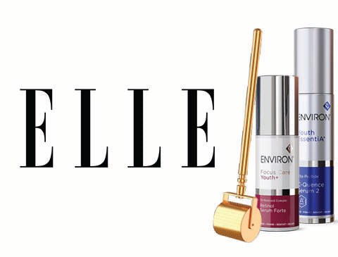 Gold roller with silver and pink serum bottles from environ