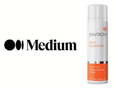 White and orange cylindrical bottle of environ skin essentia moisturising toner