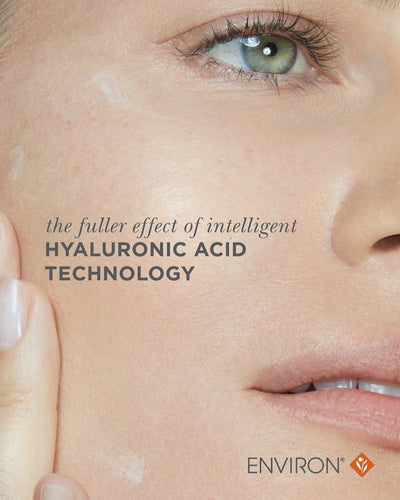 A close-up of a woman’s face with light skin tone, showcasing the application of an environ hyaluronic acid skincare product.