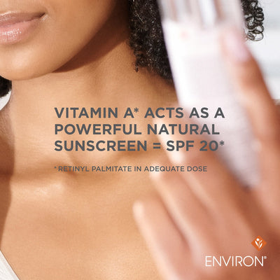 A white, sleek bottle of environ sunscreen with a minimalist design.