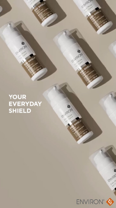 White and brown pump bottles of environ’s pro shield eye serum.