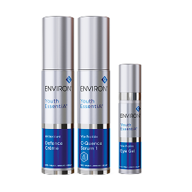 Three sleek silver cylindrical bottles of environ youth essentials skincare products, featuring blue labels with white text and a minimalist design.