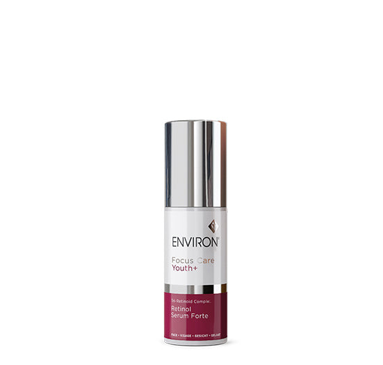 A sleek bottle of Environ Focus Care Youth+ Retinol Serum Forte stands against a white background, highlighting its advanced anti-aging tri-retinoid complex.