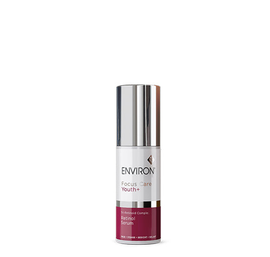 A sleek white and maroon bottle of Environ Focus Care Youth+ Retinol Serum stands prominently against a clean white background.