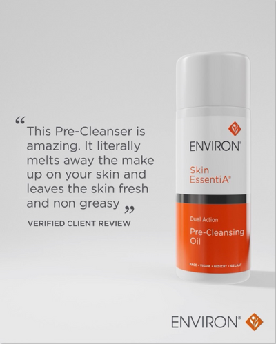 White and orange cylindrical bottle of environ skin essentia dual action pre-cleansing oil
