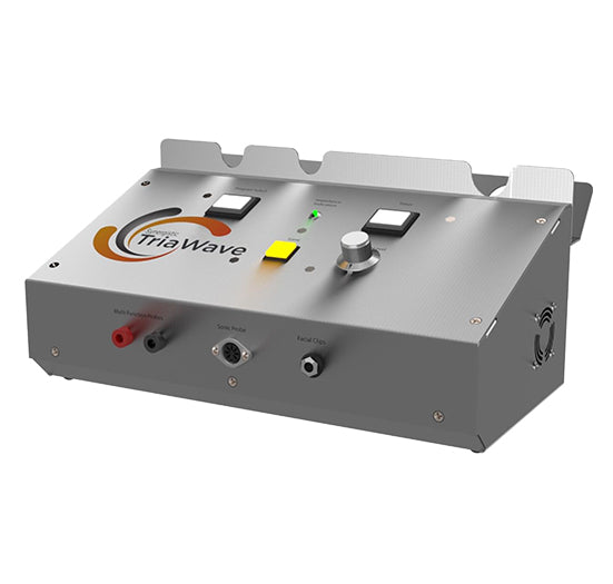 The professional Synergistic TriaWave facial treatment machine displays its brushed metal control panel and multiple connection ports for advanced skincare procedures.