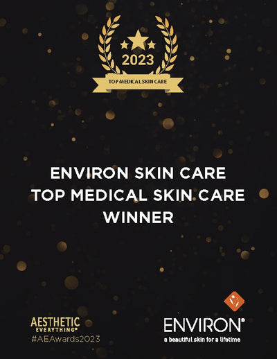 Gold laurel wreath award emblem for 2023 top medical skin care winner by environ.
