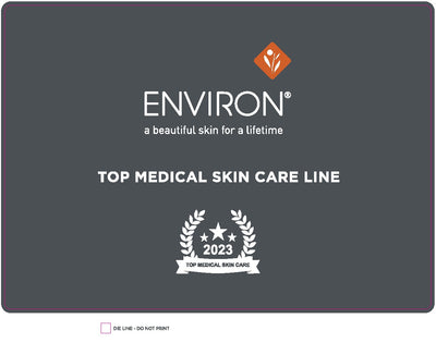 Environ’s 2023 top medical skin care line award plaque, featuring a sleek dark gray background with white text and an orange diamond logo.