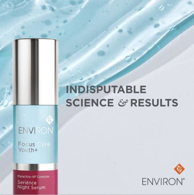Silver-topped glass bottle of environ focus care youth+ night serum with a light blue label and pink base.