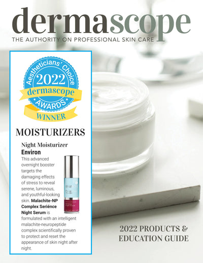 The environ night moisturizer is a sleek, transparent glass bottle with a silver cap and a vibrant pink label.