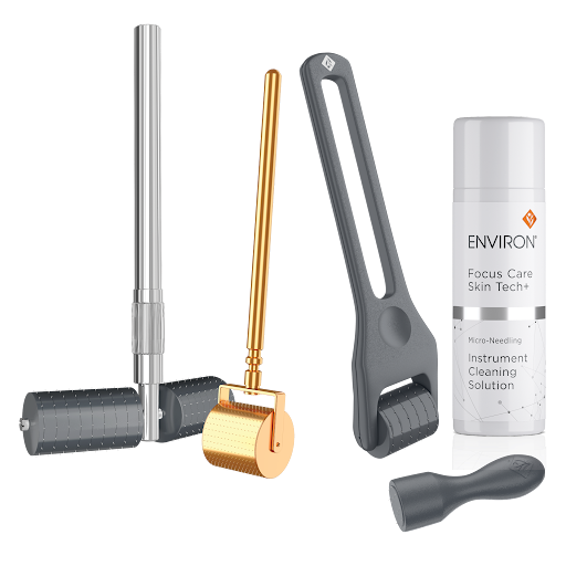 Silver and gold micro-needling roller tools with a gray handle, alongside an environ focus care skin tech+ micro-needling instrument cleaning solution in a white bottle