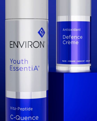 Silver and blue environ youth essentia serum bottle with a sleek metallic finish and minimalist label design.
