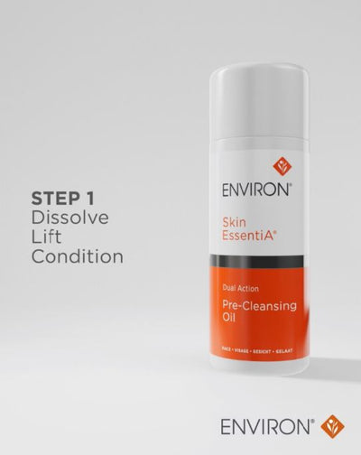 White and orange cylindrical bottle of environ skin essentia dual action pre-cleansing oil