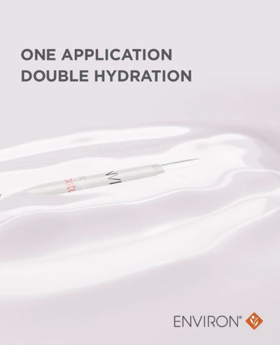 White environ skincare applicator with a fine needle tip and subtle red branding on the handle.
