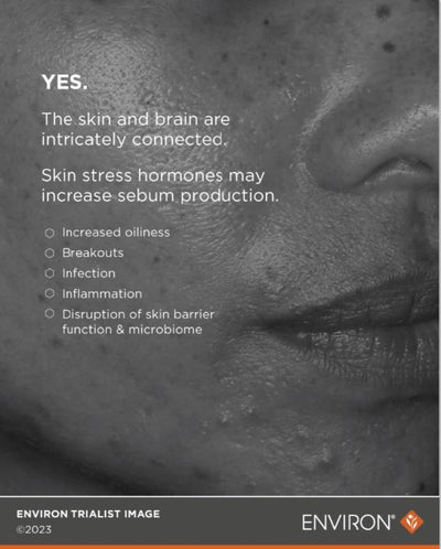 Grayscale close-up of a person’s face with visible skin texture and pores, featuring text overlay from environ skincare.